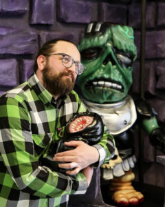 Mikee Riggs Owner of Scum Pit Comics